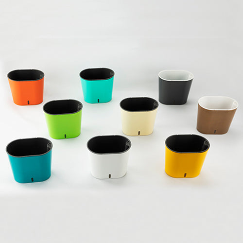 Cavendar self watering planter